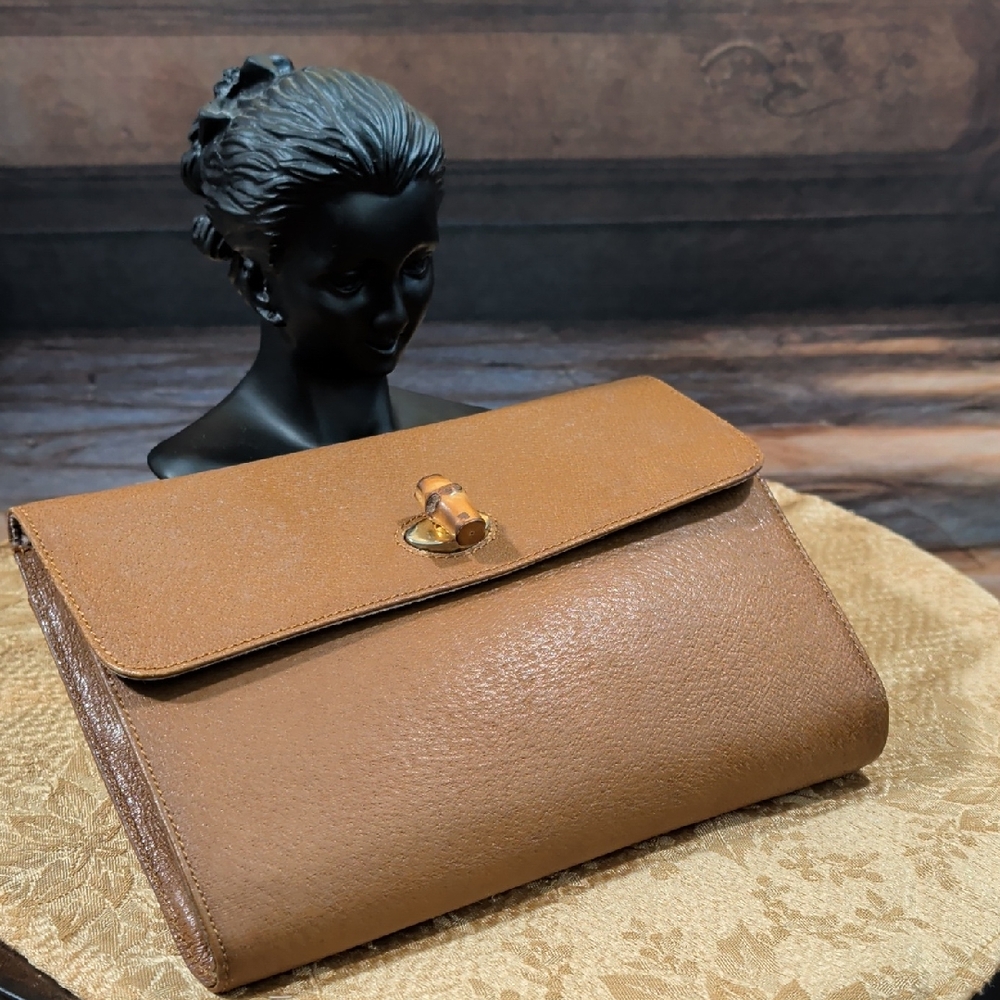 Chic Brown Leather Clutch - Picture 1 of 11